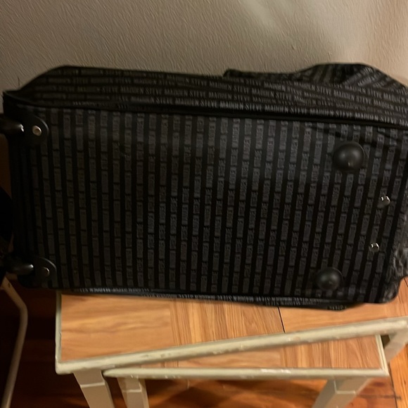 Black with Steve Madden written on it in gray large duffle bag - Picture 2 of 5